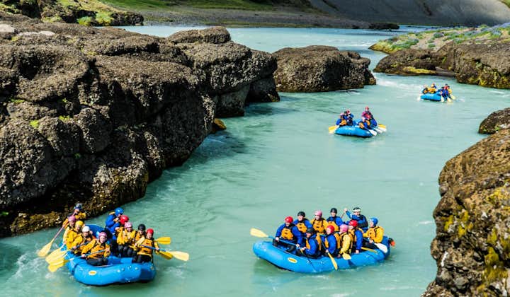 Enjoy the gentle current on a river rafting tour in South Iceland.