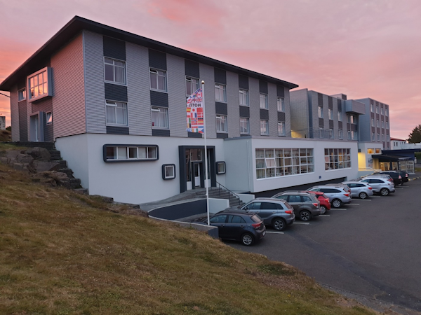 Front view with sunset at Hotel Borgarnes in West Iceland.