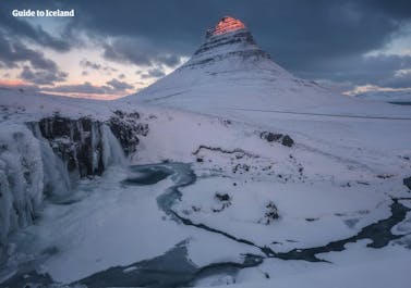 Kirkjufell, the Church Mountain, stands with a dusting of snow in winter.