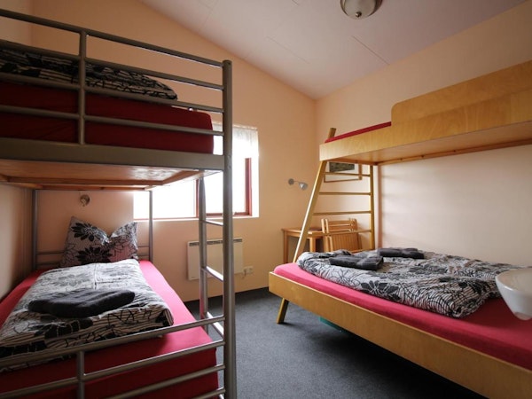 Many guests can stay in a large family room in Hvoll Hostel.