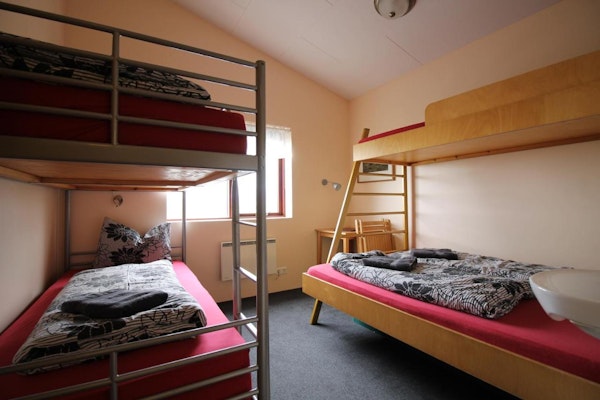 Many guests can stay in a large family room in Hvoll Hostel.