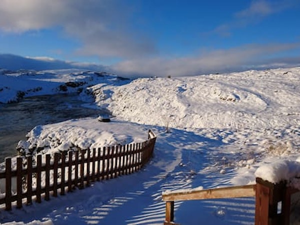 A snowy landscape around Fossatun Country Hotel.