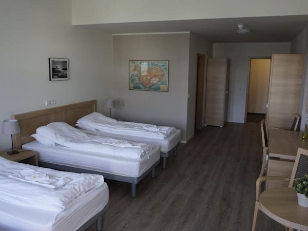 Hotel Borgarnes triple room view of three beds.
