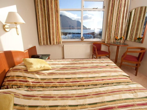 Hotel Borgarnes bed with fjord view.