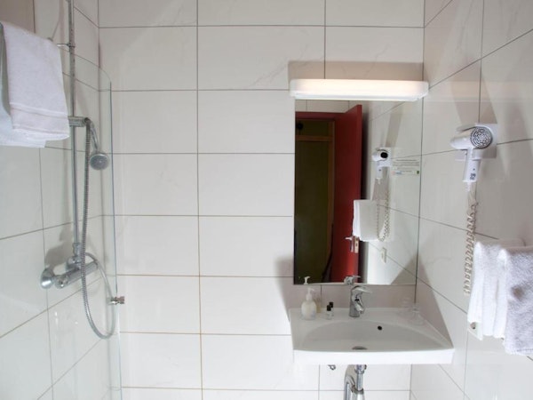 Hotel Borgarnes bathroom with sink.