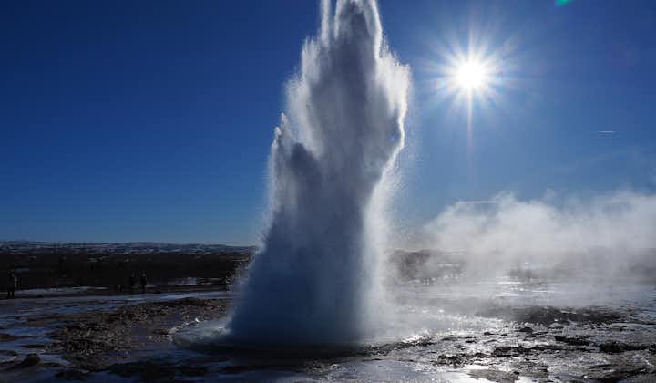 A geyser erupts in the Haukadalur Valley, a geothermal area on the Golden Circle route.