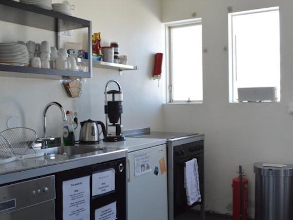 Shared fully-equipped kitchen at the Old Post Office Guesthouse.