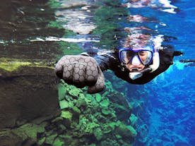 Snorkeling in the clear waters of Silfra.