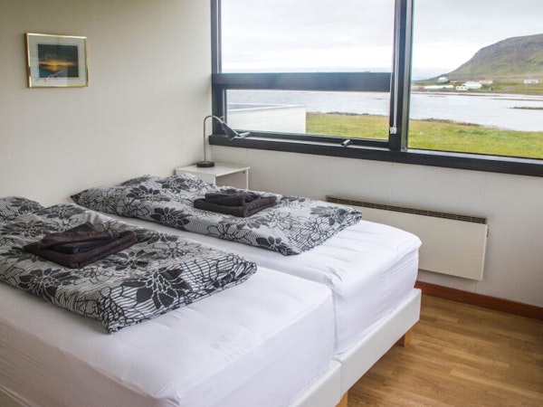 This room for two at Broddanes HI Hostel has large windows with spectacular views.