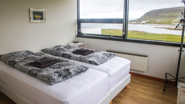 This room for two at Broddanes HI Hostel has large windows with spectacular views.