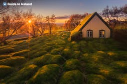 Hofskirkja turf church at sunset, Iceland's youngest turf-style church located in Southeast Iceland.