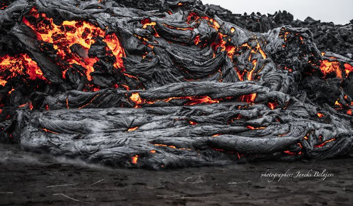 The lava flowing from the Fagradalsfjall volcano.