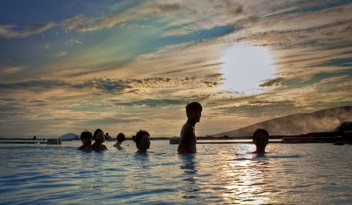 A group of travelers enjoying the waters of North Iceland's Myvatn Lake.