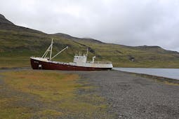 The Gardar BA 64 is a shipwreck lying on a Westfjords shoreline.