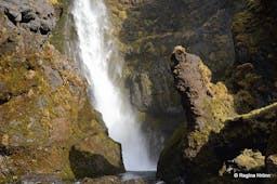Irafoss is a picturesque waterfall located between the more-famous Seljalandsfoss and Skogafoss waterfalls in South Iceland.