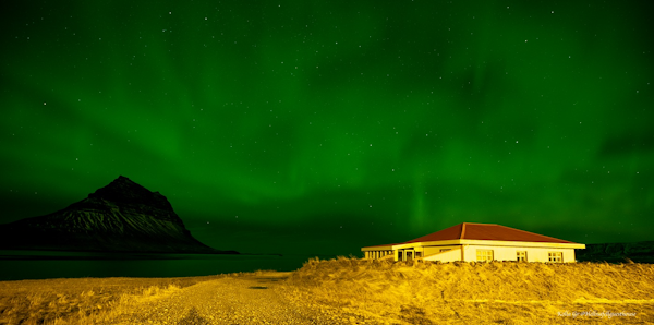 Hellnafell Guesthouse under the northern lights.