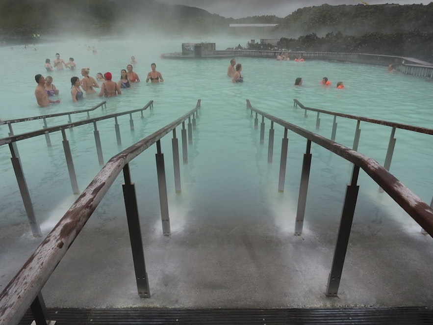 Steps leading down into the milky blue waters at the Blue Lagoon.