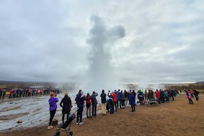 See the raw power of nature with Strokkur geyser in Iceland.