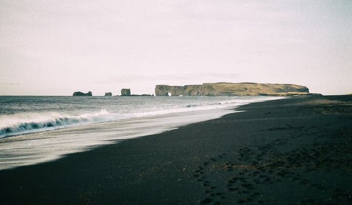 The black sands of Reynisfjara creates a beautiful contrast to the sea.