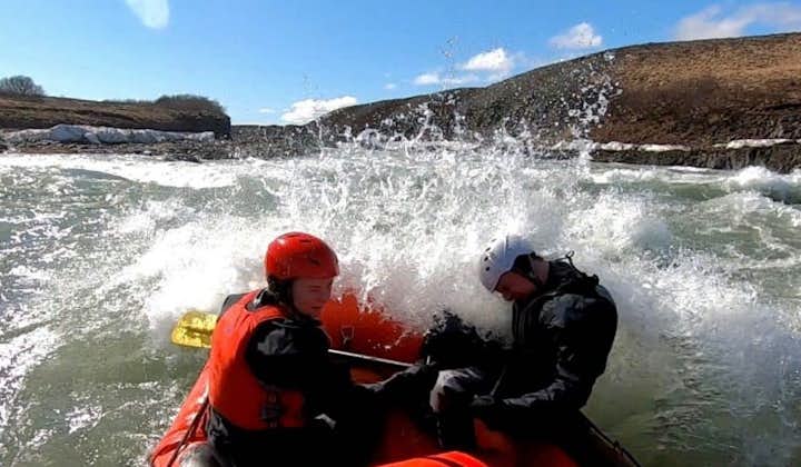 Whitewater rafting in Hvita river is a top activity in Iceland.