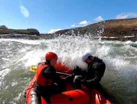 Whitewater rafting in Hvita river is a top activity in Iceland.