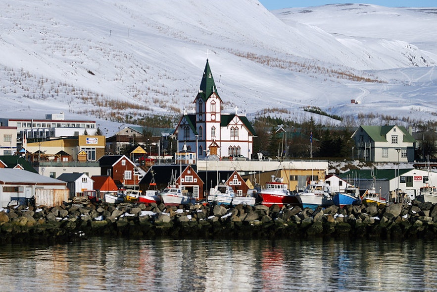 The picturesque fishing village of Husavik sits on the coastline of Skjalfandi Bay.