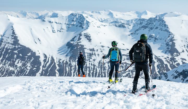 A group pauses during their Heliskiing activity at Trollaskagi.
