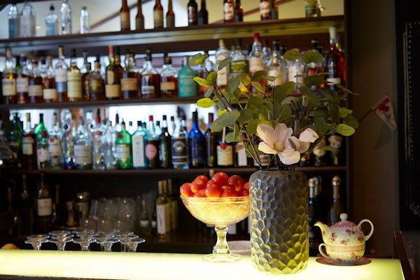 Hotel Akureyri Skjaldborg has a bar perfect for unwinding with a glass of liquor.