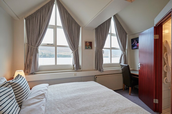 Hotel Akureyri Skjaldborg double room with an ocean view is good for up to two people.