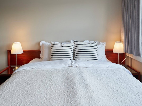 Couples on a relaxation trip will find Hotel Akureyri Skjaldborg's double room with an ocean view perfect.