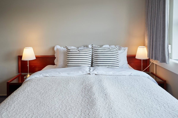 Couples on a relaxation trip will find Hotel Akureyri Skjaldborg's double room with an ocean view perfect.