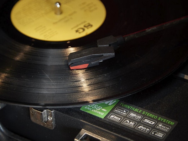 A close-up view of a record and turntable in a superior double room at Hotel Akureyri Dynheimar in central Akureyri.