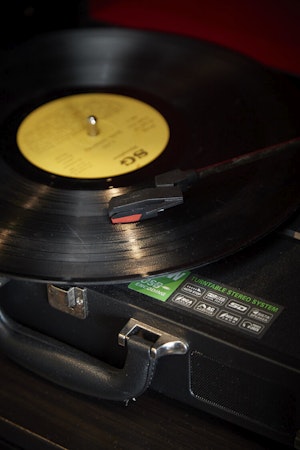 A close-up view of a record and turntable in a superior double room at Hotel Akureyri Dynheimar in central Akureyri.
