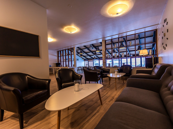 The Northern Comfort Inn's common area looks comfortable and cozy.