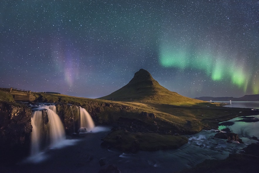 Kirkjufell under the northern lights in Iceland