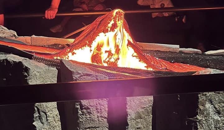 A live host shows the audience how real lava reacts and moves.
