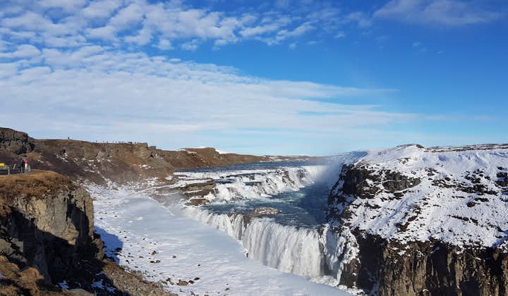 The beloved Gullfoss waterfall along the Golden Circle looks lovely surrounded by a blanket of snow.