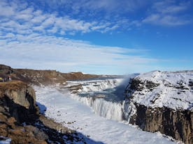 The beloved Gullfoss waterfall along the Golden Circle looks lovely surrounded by a blanket of snow.