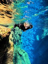 Snorkeling at Silfra fissure is a bucket list experience in Iceland you shouldn't miss.