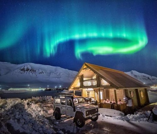 Brimnes Cabins' location allows for northern lights viewing during winter.