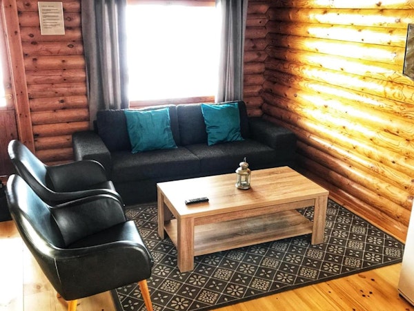 Brimnes Cabins' living room is spacious, perfect for hanging out.