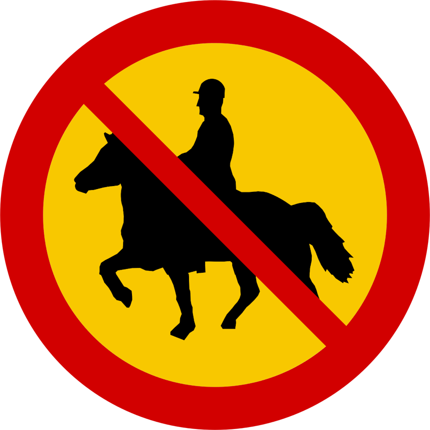 A circular yellow Icelandic road sign with a red border and line through the middle showing that horses and riders are not allowed.