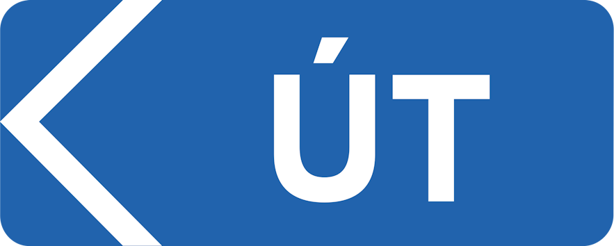A blue sign with white writing saying "ut" in Icelandic, meaning "out" in English, and showing drivers which direction to go.