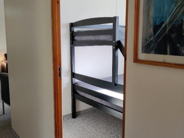 Solbrekka Guesthouse's King room has bunk beds for up to three people.