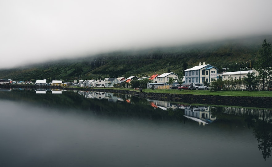 The quiet town of Seydisfjordur in the Eastfjords enveloped by fog.