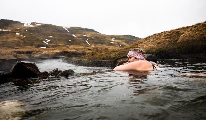 Travelers can enjoy the hot springs of Reykjadalur, while surrounded by nature.