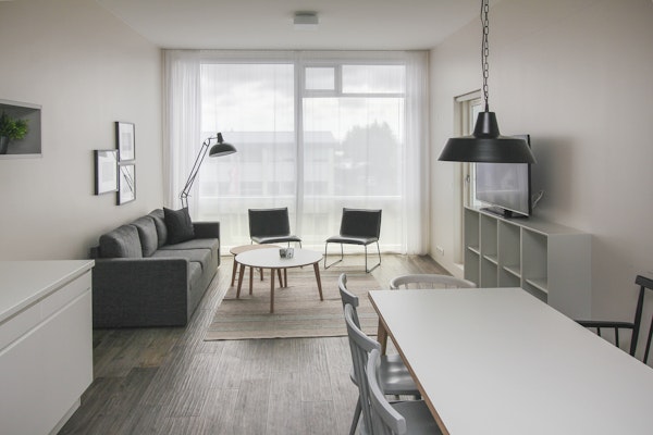 The living area in a two-bedroom apartment at Bella Hotel in Selfoss.