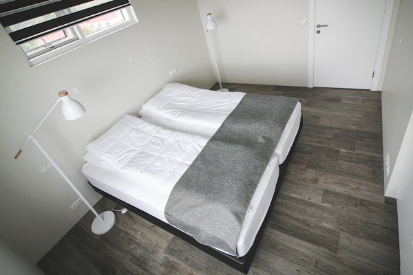 One of the bedrooms decorated in a sleek and Scandinavian style at the Bella Hotel.