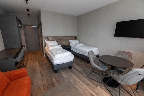 Each double room at Hotel Halond has two single beds.