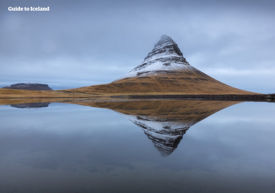 Kirkjufell mountain is easy to recognize because of its remarkable peak.
